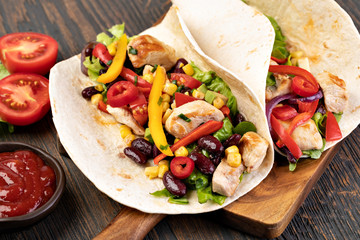 burrito with vegetables and tortilla