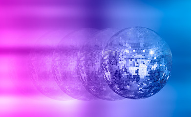 Party disco mirror ball reflecting colorful lights