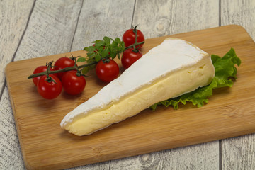 Brie cheese triangle served salad