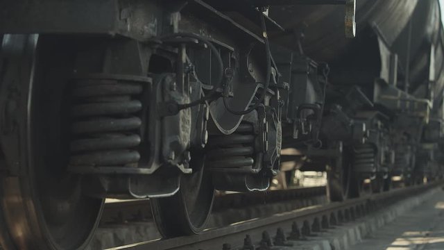 Freight train moving wheels on a railway