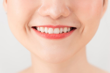 Obraz premium close up Asian girl with Red lip with white background beauty and fashion concept