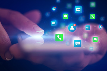 Finger touching phone with friends and contact concept and dark background