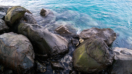 Stones in blue water