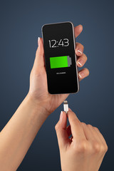 Elegant hand charging smartphone with low battery