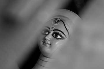 Idol of Hindu Goddess Durga during preparations in Kolkata. Clay idol of Goddess Durga, under preparation for Bengal's Durga Puja festival at Kumartuli Kolkata. Durga Puja is biggest festival in India