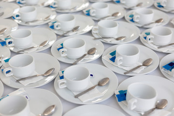 roup of empty Many rows of white ceramic coffee or tea cups