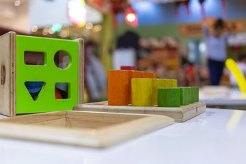 Wooden building blocks on table