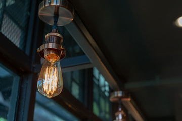 Close up of Illuminated light bulb with copy space.