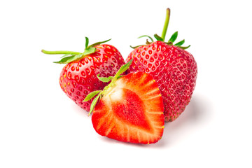 Strawberries with leaves. Isolated on a white background.