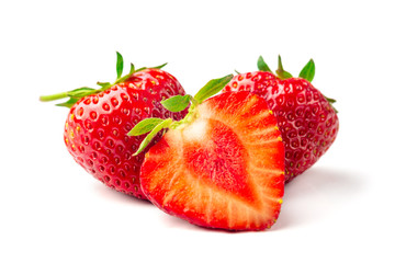 Strawberries with leaves. Isolated on a white background.