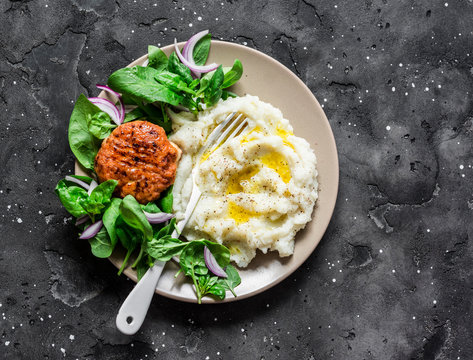 Chicken Cutlet With Cauliflower Puree And Fresh Spinach On Dark Background, Top View