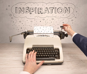 First person perspective hand writing on typewriter with cloud message concept