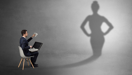 Rich businessman staying and offering stuffs to a pretty shadow woman