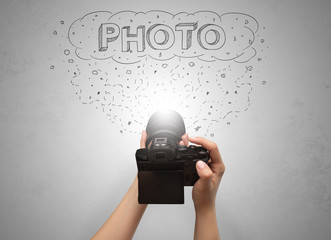 Naked hand photo shooting with message cloud concept and doodles