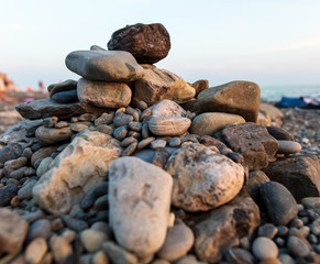 Fototapeta na wymiar Stone mound on the seashore
