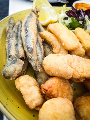 fried sea food - shells, fish, shrimps