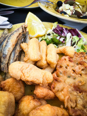 fried sea food - shells, fish, shrimps