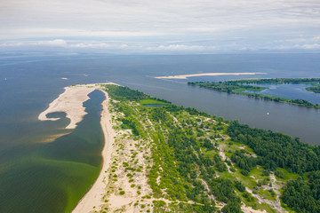 Aerial view of the Vistula river mouth to the Baltic sea. Poland. Photo made by drone from above....