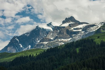 Fototapeta na wymiar Beautiful swiss alps mountains. Alpine meadows. 
