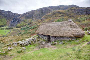 Picture of typical Irish landscape with medieval stone house