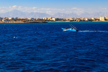 Old fishing boat sailing in the Red sea, Egypt