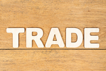 Naklejka premium word trade from wooden letters