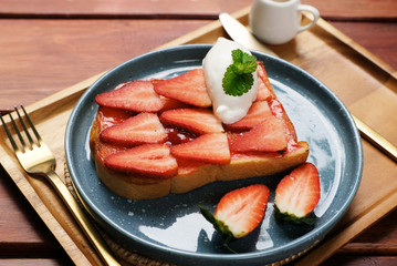 closeup strawberry toast with maple syrup