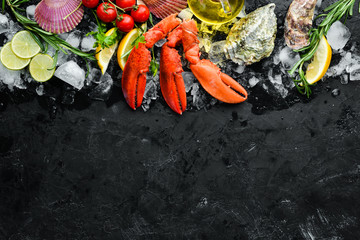 Lobster claws. Seafood on a black background. Top view. Free copy space.