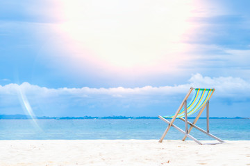 Colorful beach chairs Placed on the sand and peaceful sea Suitable for resting on weekends. Or summer