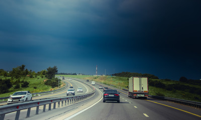 Russian asphalt roads. Highway. Road trip. The car goes on the road. Background asphalt road.