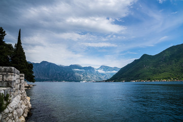 Montenegro, Spectacular mountains surrounding kotor bay fjord with small towns and villages