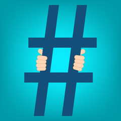 Obraz premium Social media prisoner. Human hands holding prison bars stylized as hashtag. Social media addiction concept