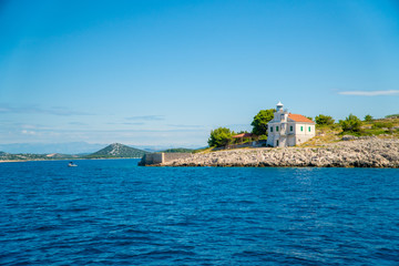 Lighthouse on the rocky island in Croatia, Europe