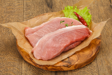 Juicy raw pork steak meat