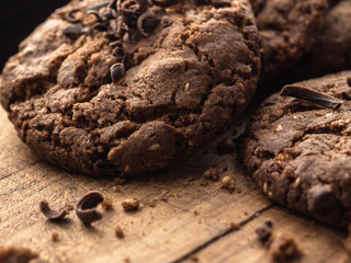 Fototapeta premium oatmeal cookies with chocolate sprinkle on a wooden board