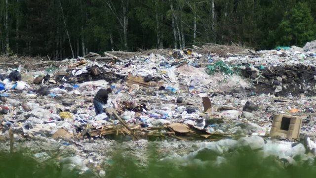 Plastic waste dumping site. Great rubbish dump, environmental problems. Garbage pile in trash dump or landfill. Earth pollution concept.