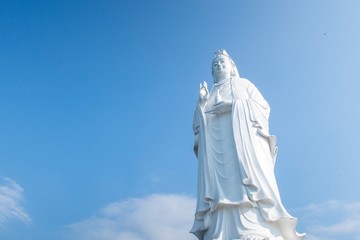 Fototapeta premium Lady Buddha Da Nang is located at Linh Ung Pagoda on Son Tra Peninsula in Da Nang which is 9 km away from My Khe beach, or 14 km from Da Nang city center. 