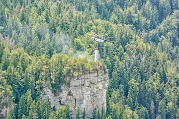 Fire helicopter extinguishes fire in the forest, Big Fatra, Slovakia