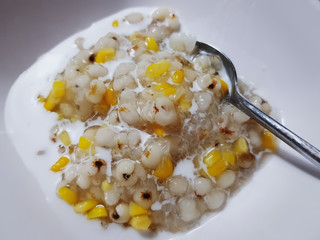 Thai Cereal Dessert made with Coix Seeds and Corn Seeds in Coconut Milk