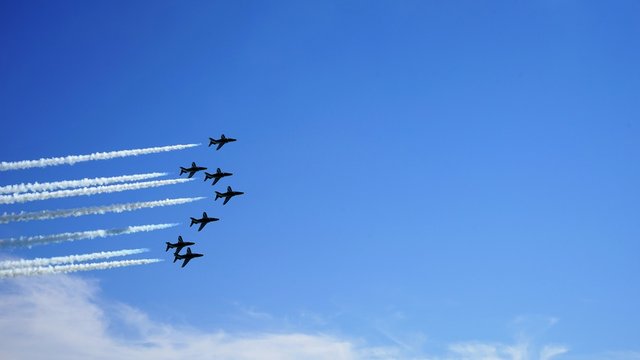 few airplanes in the sky