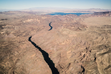 Fototapeta na wymiar Aerial beautiful scenic view of Colorado river and the canyons and deserts from a plane in Arizona