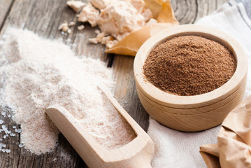slice of bread and ingredients on old weathered wooden table