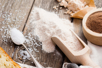 slice of bread and ingredients on old weathered wooden table