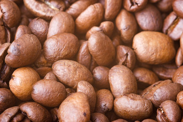 Roasted coffee beans, closeup. Background.