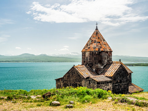 Sevanavank monastery and turquoise water of lake Sevan in Armenia