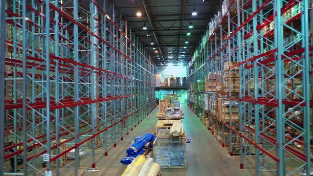 Aerial view of a giant modern postal warehouse with parcel storage shelves