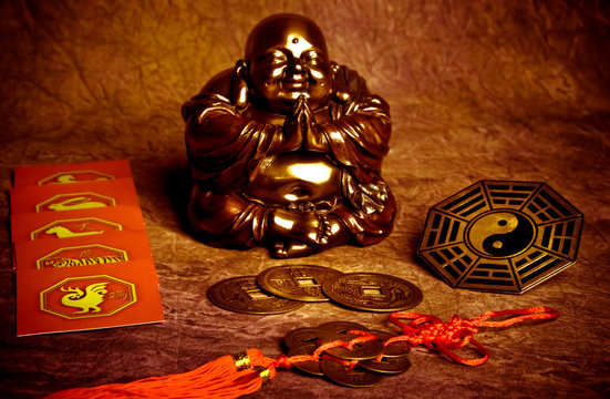Oriental belief with happy Buddha, coins of good luck, yin yang and chinese zodias signs - Powered by Adobe