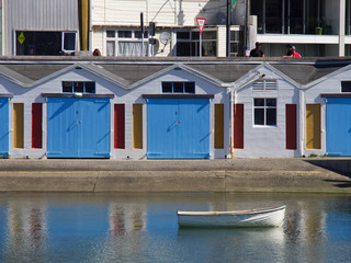 Fototapeta na wymiar Row of colourful boat sheds in central Wellington, New Zealand