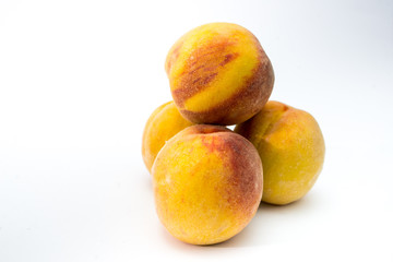 fresh apricots on white background