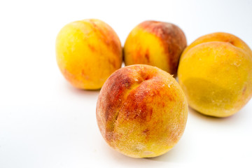 peaches isolated on white background